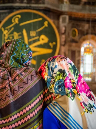two-scarfed-women-in-a-temple-2024-11-27-20-19-03-utc